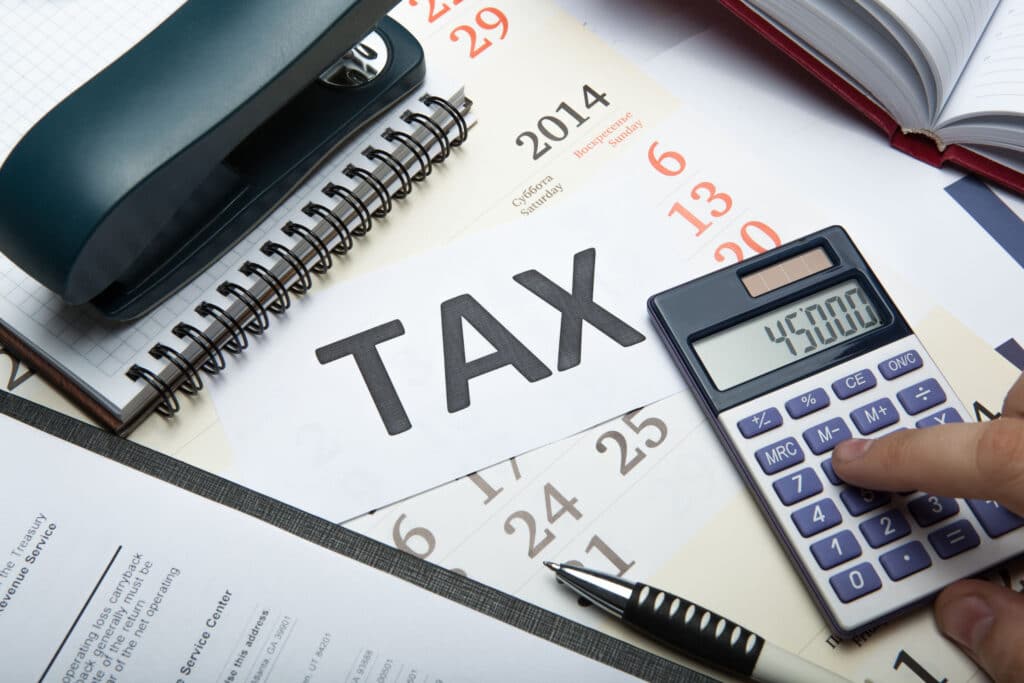 44968867 – office work and filling in tax returns close up ภาษีคืออะไร